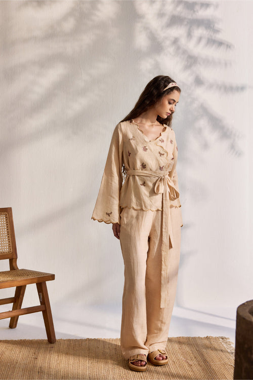 Almond linen overlapping bird printed top with linen pants and belt