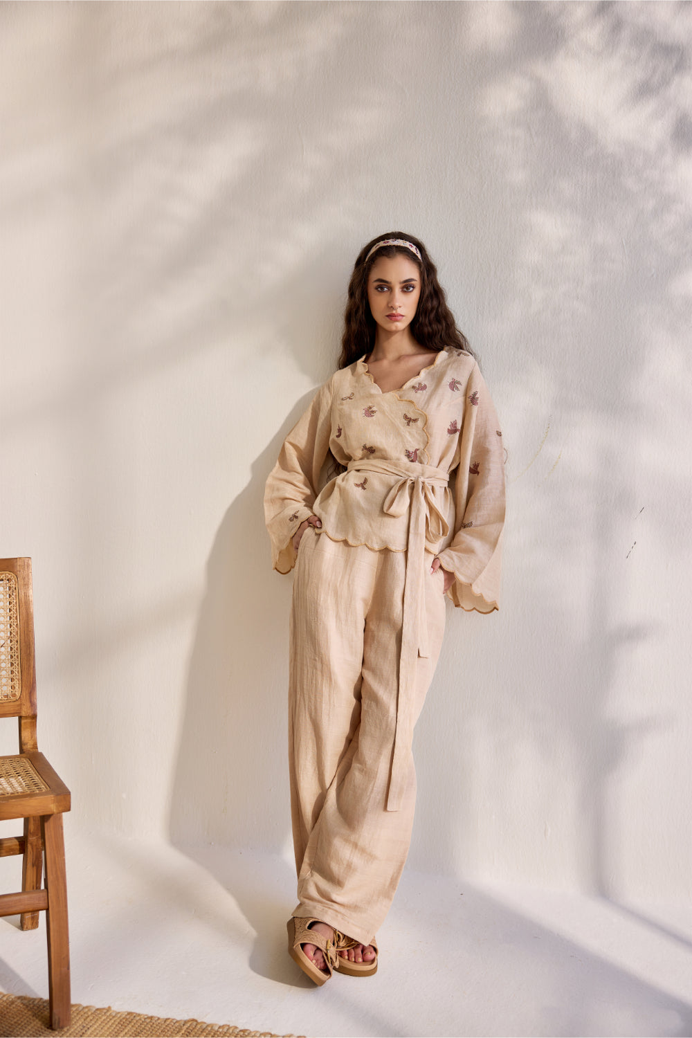 Almond linen overlapping bird printed top with linen pants and belt