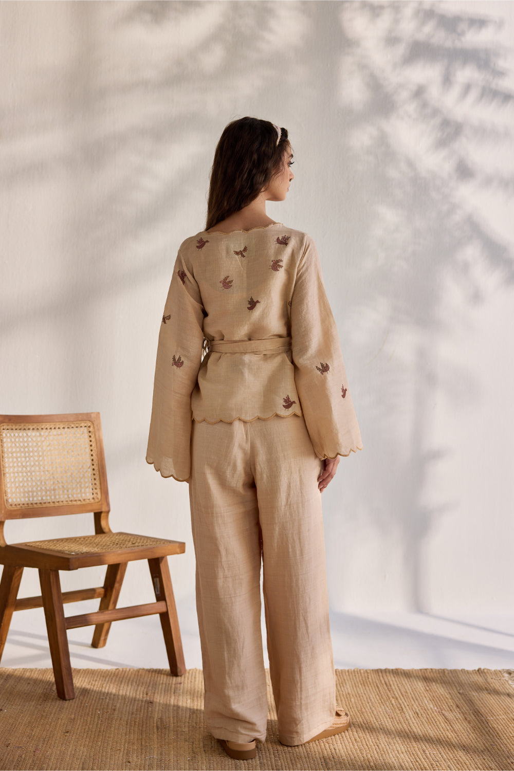 Almond linen overlapping bird printed top with linen pants and belt