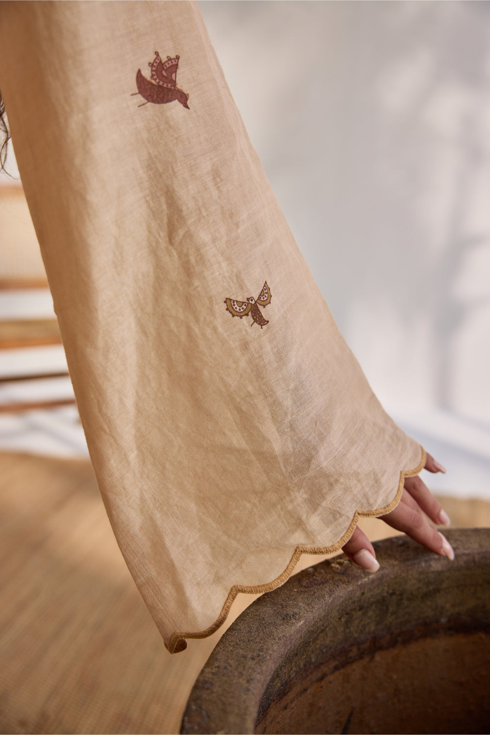 Almond linen overlapping bird printed top with linen pants and belt