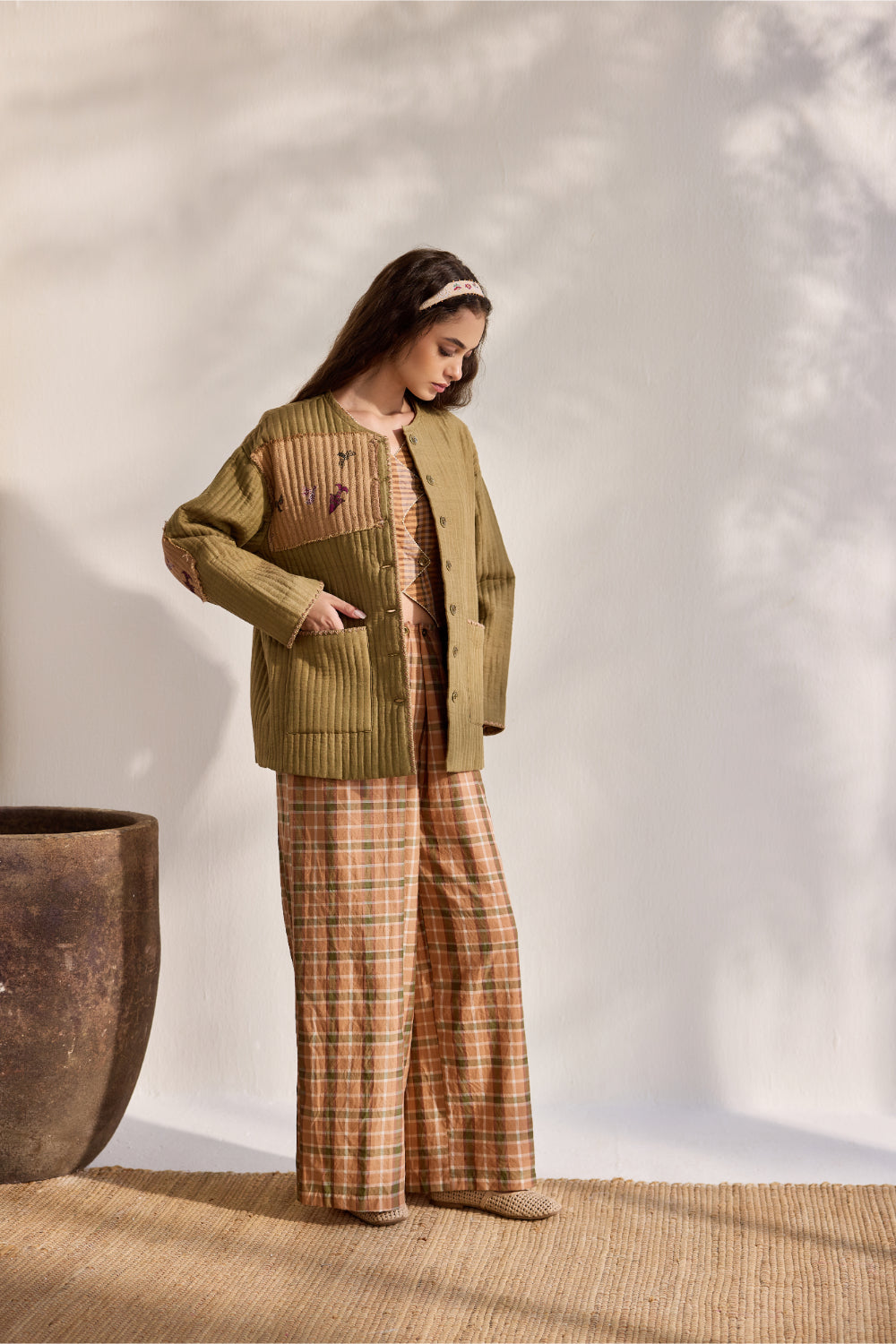 Military green quilted jacket with jacquard printed patchwork