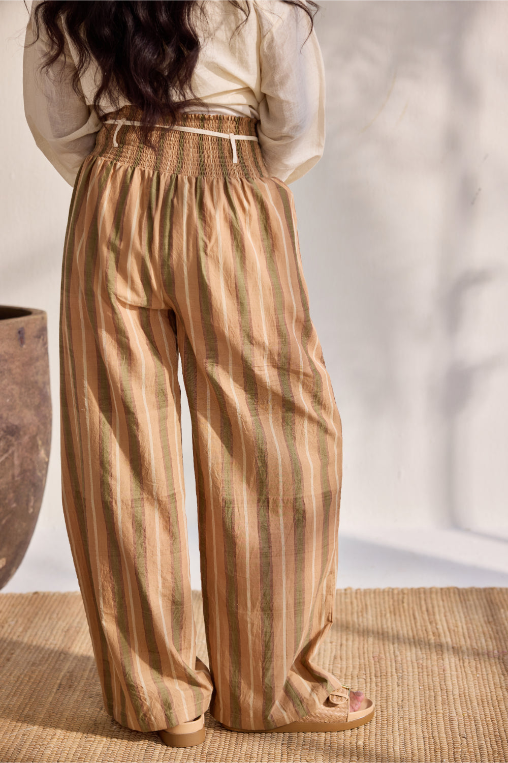 Beige woven stripe pants with applique